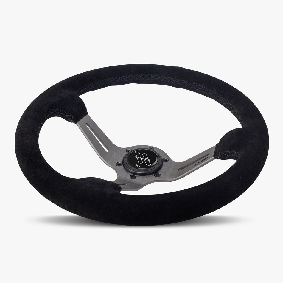 The Le Mans | Black Alcantara Suede | Graphite Spoke | Black Stitch